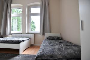 Cama o camas de una habitación en Workers Apartment Leverkusen