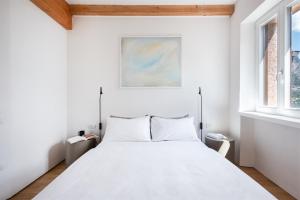 Posteľ alebo postele v izbe v ubytovaní Maison Du Lac