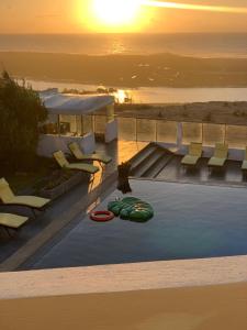 a swimming pool with a frisbee in the water at Auberge Oualidia Dream in Oualidia