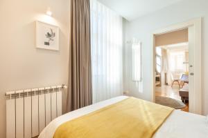 Postel nebo postele na pokoji v ubytování D&S - Ribeira Premium Apartments