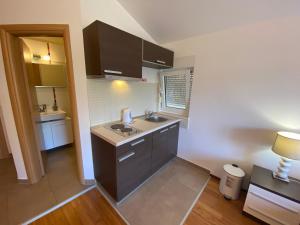 Koupelna v ubytování Apartments San Monte + 112 fotografií