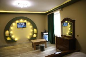 TV a/nebo společenská místnost v ubytování Hotel Gold