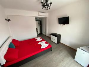 Postel nebo postele na pokoji v ubytování Cool Breeze - Mamaia Nord