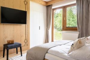 Posteľ alebo postele v izbe v ubytovaní Willa MAJA Relax pod Giewontem APARTZAKOP