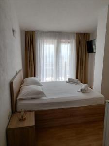 Postel nebo postele na pokoji v ubytování Steko Accomodations