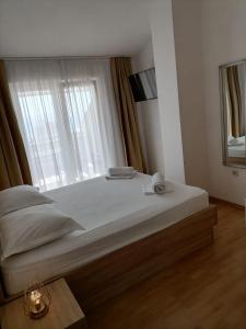 Postel nebo postele na pokoji v ubytování Steko Accomodations
