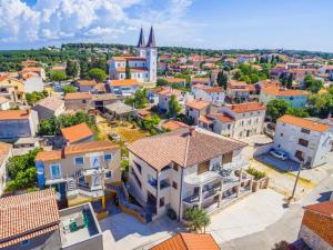 an aerial view of a town with houses at Medulinka apartments in Medulin