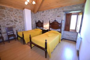 Postel nebo postele na pokoji v ubytování Casa dos Cavaleiros com piscina privada