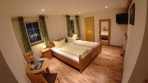 Postelja oz. postelje v sobi nastanitve Hotel Almrausch