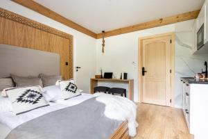 Posteľ alebo postele v izbe v ubytovaní Willa MAJA Relax pod Giewontem APARTZAKOP
