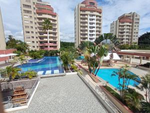 Bazén v ubytování Departamento 4 habitaciones 12 personas vista al mar 8vo piso Playa Almendro nebo v jeho okolí