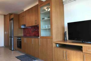 Kuchyňa alebo kuchynka v ubytovaní Cozy seafront loft - Kat's rentals