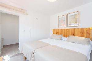 Posteľ alebo postele v izbe v ubytovaní Higuerón Rental Playa Cuesta + 36 fotografií