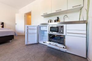 Η κουζίνα ή μικρή κουζίνα στο Apartment 11