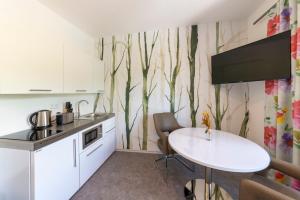 Η κουζίνα ή μικρή κουζίνα στο Apartment 11 +3 φωτογραφίες