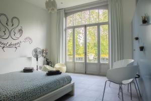 Katil atau katil-katil dalam bilik di PLANT BASED b&b central Bruges
