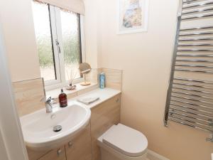 Koupelna v ubytování Butterfly Lodge + 12 fotografií