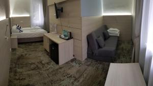 Camera piccola con divano e letto. di Willa Nest a Unieście