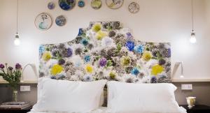 Postel nebo postele na pokoji v ubytování Cinque Rooms + 37 fotografií