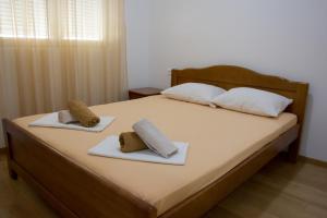 Apartments Milica tesisinde bir odada yatak veya yataklar