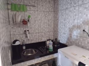 Dapur atau dapur kecil di Apartamento 104 Centro Consolação
