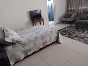Katil atau katil-katil dalam bilik di Apartamento 104 Centro Consolação