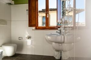Kúpeľňa v ubytovaní Villa Montarioso + 37 fotografií