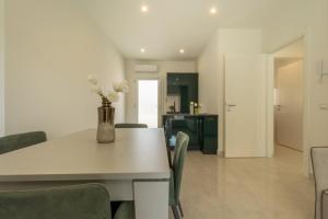 Η κουζίνα ή μικρή κουζίνα στο Residence Meridian Unità 1