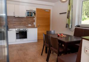 A kitchen or kitchenette at Apart welcom