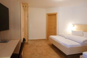 A bed or beds in a room at Apart welcom