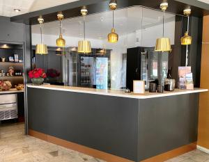 Nhà bếp/bếp nhỏ tại Hotel Amadeus by First