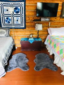 Postel nebo postele na pokoji v ubytování Jade Fever Cabina