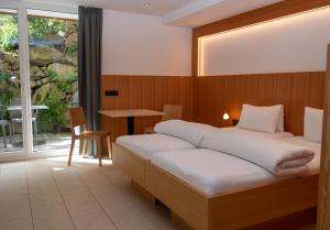 A bed or beds in a room at Apart welcom