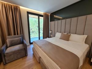 Letto o letti in una camera di Hotel Aross