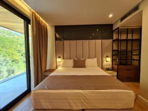 Letto o letti in una camera di Hotel Aross