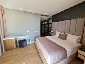 Letto o letti in una camera di Hotel Aross