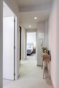 Posteľ alebo postele v izbe v ubytovaní MARBELLA BANUS SUITES - Ceibo Centro Plaza Banús Suite Apartment
