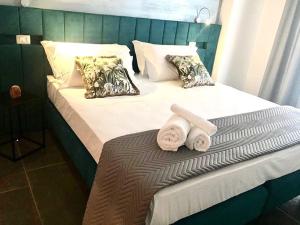 Postel nebo postele na pokoji v ubytování B&B Maria