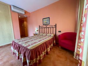 Łóżko lub łóżka w pokoju w obiekcie Quéntar Hotel Rural