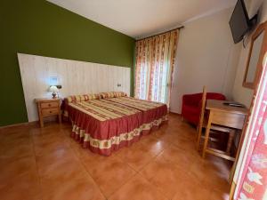 Łóżko lub łóżka w pokoju w obiekcie Quéntar Hotel Rural