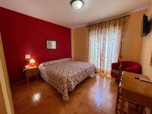 Łóżko lub łóżka w pokoju w obiekcie Quéntar Hotel Rural