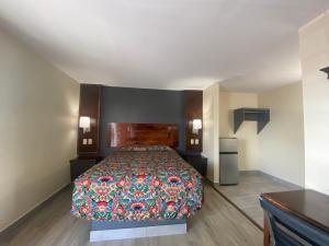Posteľ alebo postele v izbe v ubytovaní Relax Inn-Plaquemine