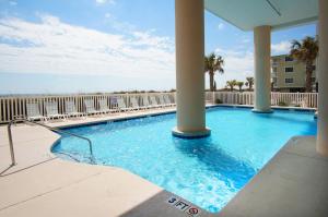 a swimming pool with a view of the beach at Laguna Keyes 707 in Myrtle Beach
