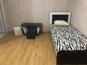 Postel nebo postele na pokoji v ubytování Akhaltsikhe hotel “Sunny House”