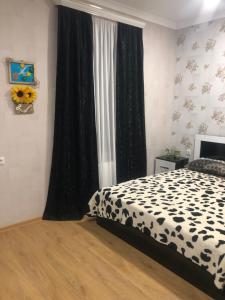 Postel nebo postele na pokoji v ubytování Akhaltsikhe hotel “Sunny House”