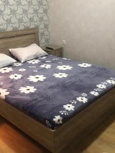 Postel nebo postele na pokoji v ubytování Akhaltsikhe hotel “Sunny House”