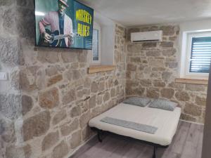 Postel nebo postele na pokoji v ubytování Split Stone