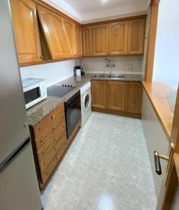 Kuchyňa alebo kuchynka v ubytovaní Apartaments Club Nautic L'Escala