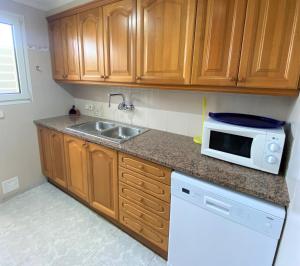 Kuchyňa alebo kuchynka v ubytovaní Apartaments Club Nautic L'Escala