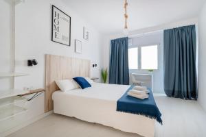 מיטה או מיטות בחדר ב-Casa M&J GuestHouse